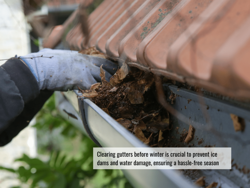 Hands wearing blue gloves cleaning out the leaves from the gutter of a roof